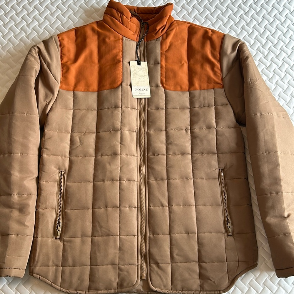 New Nomad puffer.